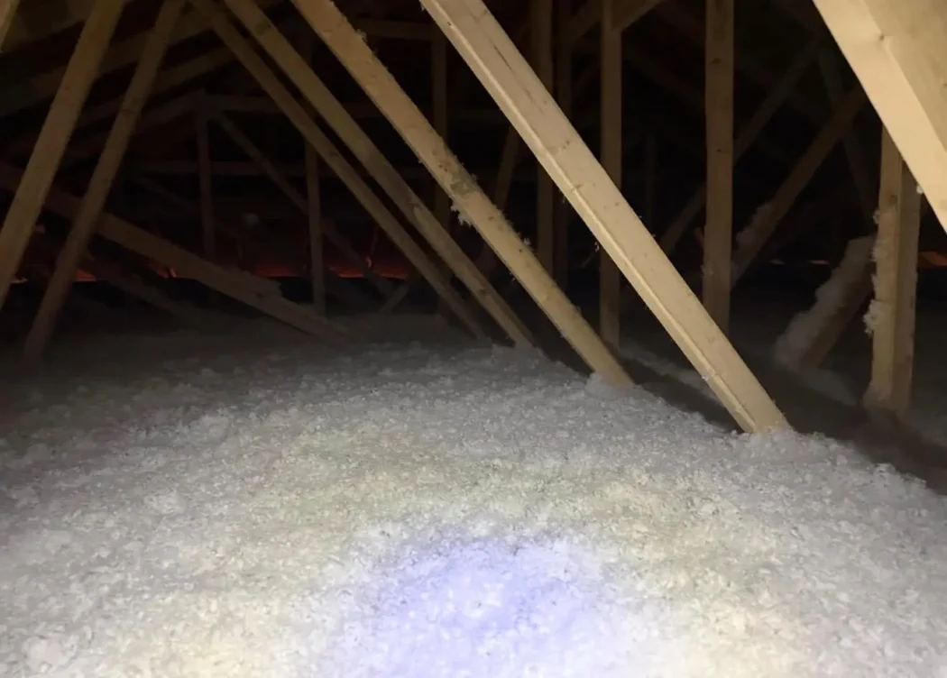 Attic insulation being installed for a Medicine Hat home
